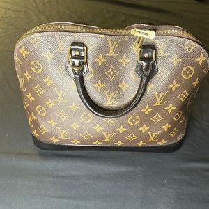 Authentic Louis Vuitton Alma Monogram and Black